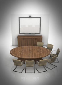 oval table and chairs in conference room