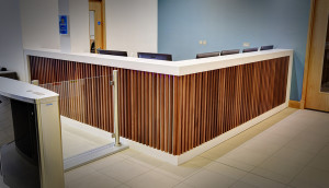 Modern reception counter with entrance gate