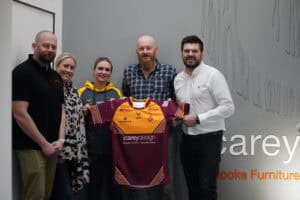 J Carey Design sponsor Huddersfield Giants Women's Team captain, Bethan Oates displaying the new season shirt with directors (L-R) Steve Dent, Laura Tillotson, Steve Ashworth and Richard Tillotson.